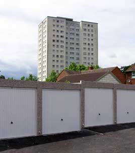 A stepped block of Heritage garages compliments these new-build houses